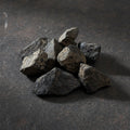 Natural raw lodestone magnetite stone for magnetic ritual work, altar display, and mineral collecting.