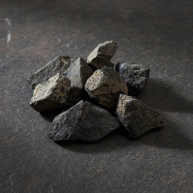 Natural raw lodestone magnetite stone for magnetic ritual work, altar display, and mineral collecting.