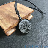 Natural Obsidian gemstone Tree of Life pendant for meditation, spiritual balance, and daily accessory wear.