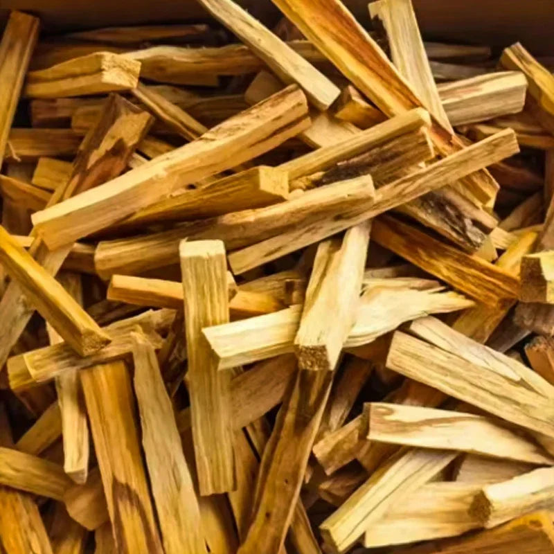 Natural Palo Santo Incense Sticks stacked showing natural warm brown wood color.