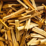 Natural Palo Santo Incense Sticks stacked showing natural warm brown wood color.