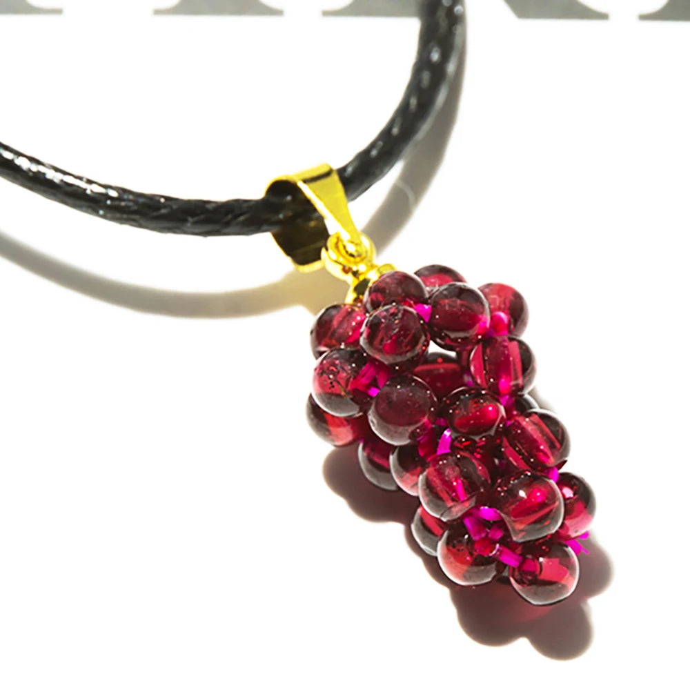 Natural red garnet grape charm necklace with pendant detail for stylish accessorizing, date night wear, and gift giving.