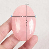 Natural Rose Quartz Crystal Palm Stone for meditation, crafts, and crystal healing.