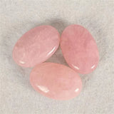 Natural Rose Quartz Crystal Palm Stone for meditation, crafts, and crystal healing.