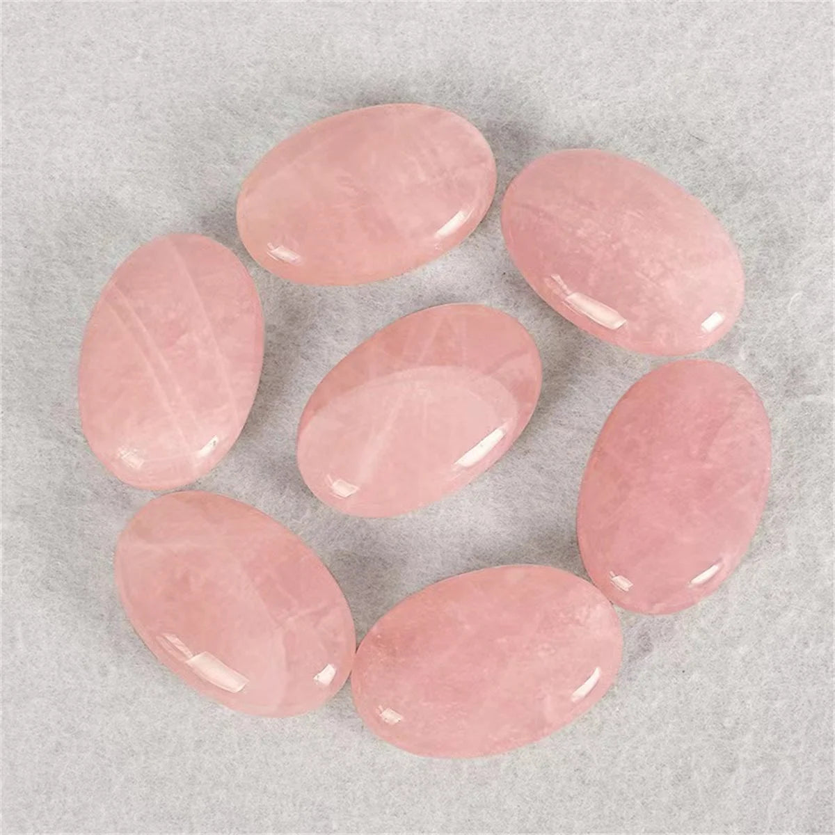 Natural Rose Quartz Crystal Palm Stone for meditation, crafts, and crystal healing.