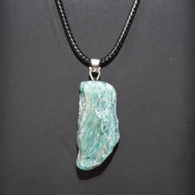 Natural rough purple amethyst pendant with raw gemstone form for crystal healing, mindful meditation, and personal wear.