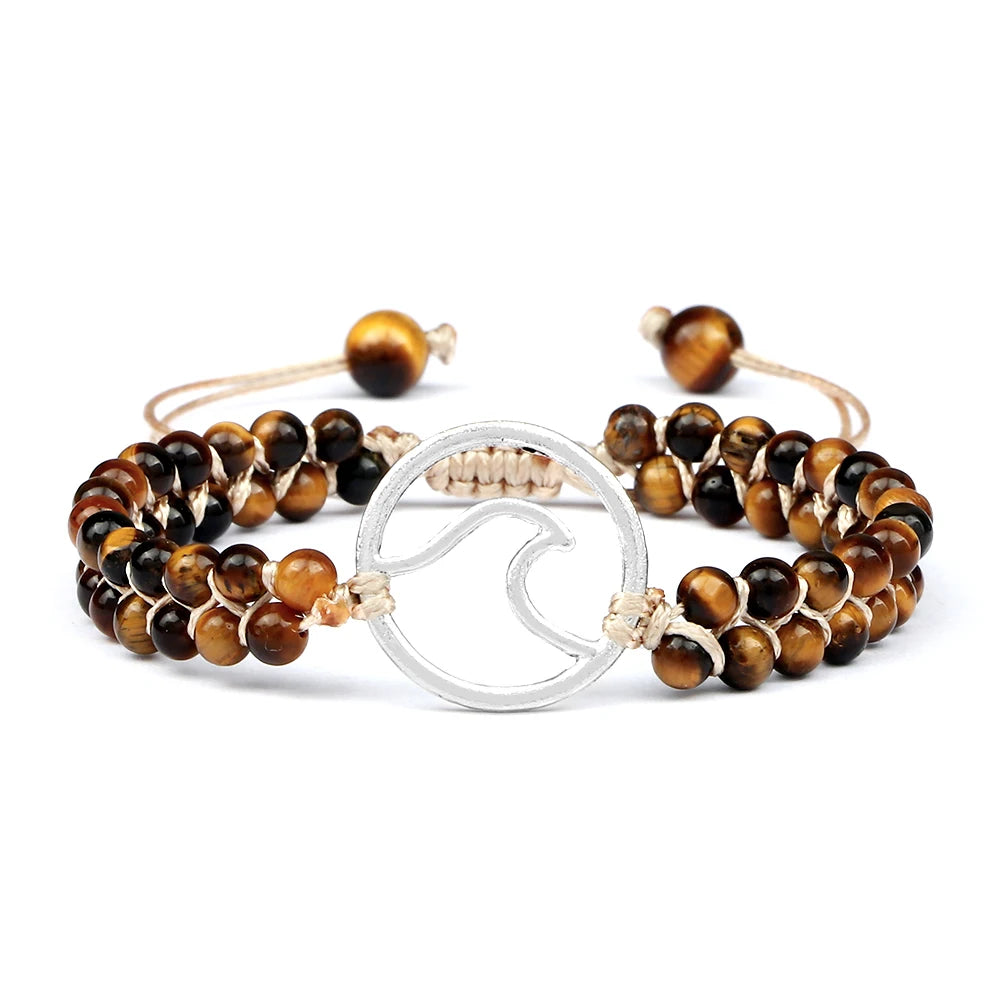 Natural Tiger Eye beaded wrist bracelet with charm for daily jewelry wear, spiritual styling, and casual accessorizing.