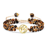 Natural Tiger Eye crystal bracelet with charm for spiritual accessory use, mindful styling, and everyday jewelry wear.