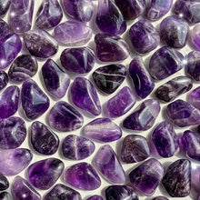 Natural Tumbled Amethyst Healing Stones for meditation, crafts, and crystal healing.