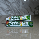 Neem Essential Toothpaste tube for daily brushing, oral hygiene, and fresh breath care.