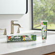 Neem Essential Toothpaste tube for brushing teeth, freshening breath, and routine oral care.