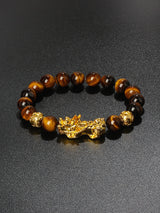 Obsidian Pi Xiu good fortune bracelet for attracting success, protection, and everyday spiritual wear.