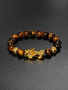 Obsidian Pi Xiu good fortune bracelet for attracting success, protection, and everyday spiritual wear.