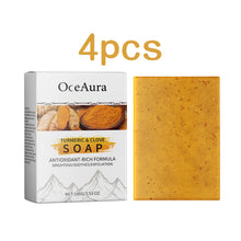 OceAura Turmeric Clove Handmade Soap packaging and bar display on white background.