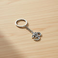 Om keychain symbol accessory for keys, bags, and everyday spiritual carry.