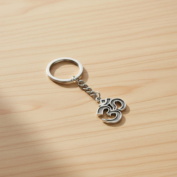 Om keychain symbol accessory for keys, bags, and everyday spiritual carry.