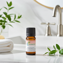 Orange Essential Oil bottle for uplifting aromatherapy, warm diffuser blends, and cheerful home fragrance use.