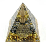 Orgonite Crystal Pyramid Energy Generator for meditation, energy healing, and home décor.