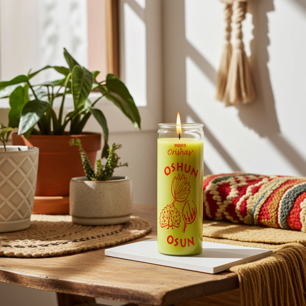 OSHUN ORISHAS yellow 7 day candle in glass jar for altar offerings, prayer, and spiritual devotion.
