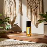 Oud body oil bottle for moisturizing skin, softening dry areas, and daily body care.