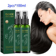 OUHOE Ginseng Hair Serum Spray with woman with long black hair on white background.