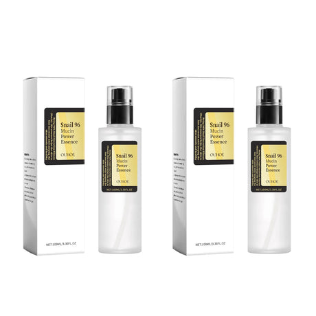 OUHOE Nourishing Snail Power Essence bottle for fine line care, skin replenishing, and moisturizing the face.