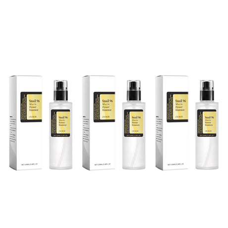 OUHOE Smoothing Snail Mucin Power Essence bottle for dry and tired skin, helping support hydration and a softer-looking complexion.