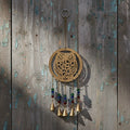 Owl brass bell chime large in gold metal for hanging decor, wind chime, and ritual bell use.