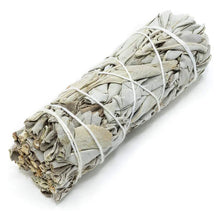 Palo Santo & White Sage cleansing bundle with palo santo sticks and sage smudge stick for home cleansing, meditation, and ceremonial practice.