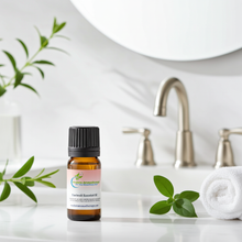 Patchouli essential oil bottle for grounding aromatherapy, meditation diffusing, and Oriental perfume blending use.