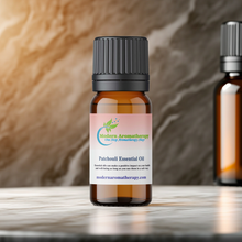 Patchouli essential oil bottle for diffuser use, grounding home fragrance, and deep earthy aromatherapy.