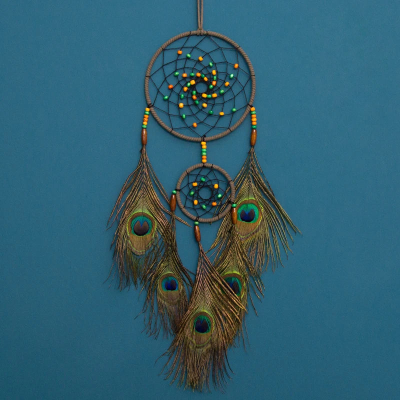 Peacock Feather Vintage Dream Catcher wall hanging for bedroom decor, dream protection, and calming sleep space design.