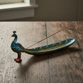Peacock polyresin incense holder for stick incense burning, decorative display, and altar use.