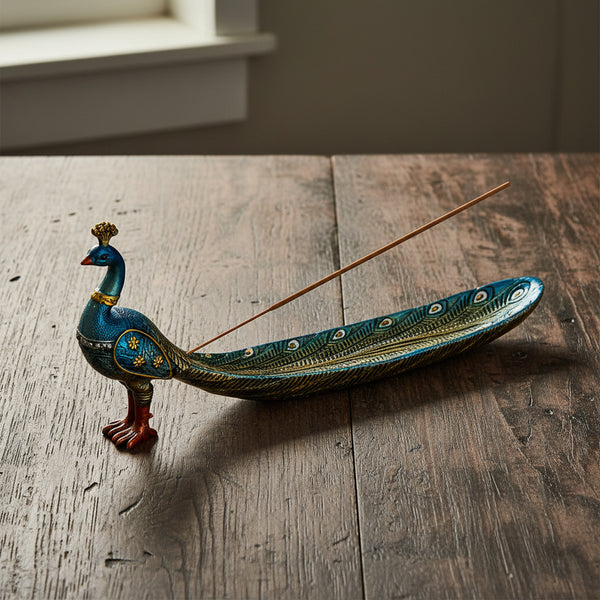 Peacock polyresin incense holder for stick incense burning, decorative display, and altar use.
