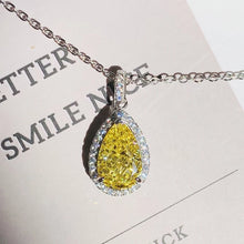 Pear-cut Yellow Zirconia jewelry pendant for formal wear, fashion styling, and gift occasions.