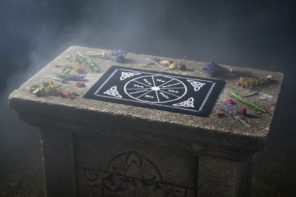 Pendulum mat with Celtic design for dowsing, divination practice, and pendulum readings.