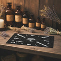 Pendulum mat with Tree of Life design for dowsing, divination practice, and pendulum readings.