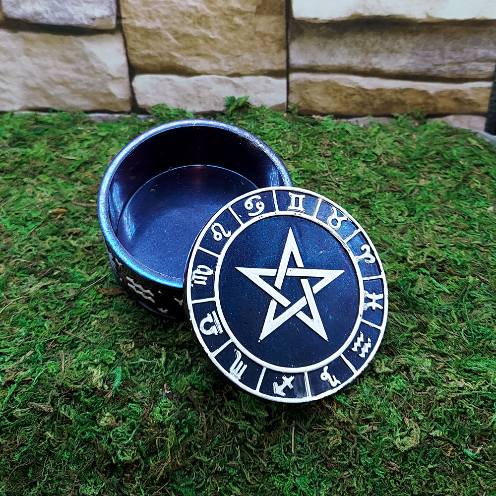 Pentacle engraved trinket box for organizing rings, charms, and altar accessories.