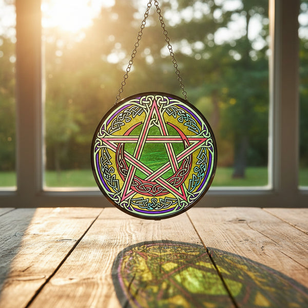 Pentacle glass suncatcher for window display, light-catching decor, and altar room styling.