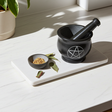 Black Pentacle mortar and pestle set for grinding herbs, resins, and incense for altar work and ritual use.