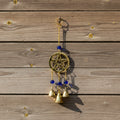 Pentacle windchime with beads for hanging outdoor decor, porch styling, and altar space ambiance.
