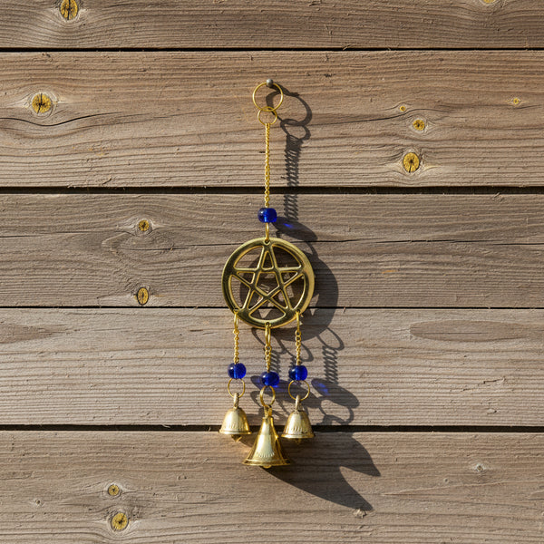 Pentacle windchime with beads for hanging outdoor decor, porch styling, and altar space ambiance.