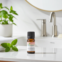 Peppermint essential oil bottle for clarifying aromatherapy, headache relief, and invigorating diffuser use.