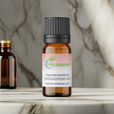 Peppermint Essential Oil dropper bottle for diluted massage blends, aromatherapy, and self-care routines.