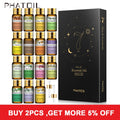 PHATOIL 15-piece essential oil set: fifteen 5ml amber bottles including cinnamon, vanilla, ylang ylang, eucalyptus, lemon, sandalwood, sweet orange, lavender, jasmine, tea tree, rose, lemongrass, peppermint, rosemary and chamomile, with two droppers and a black Diary of Essential Oils gift box.