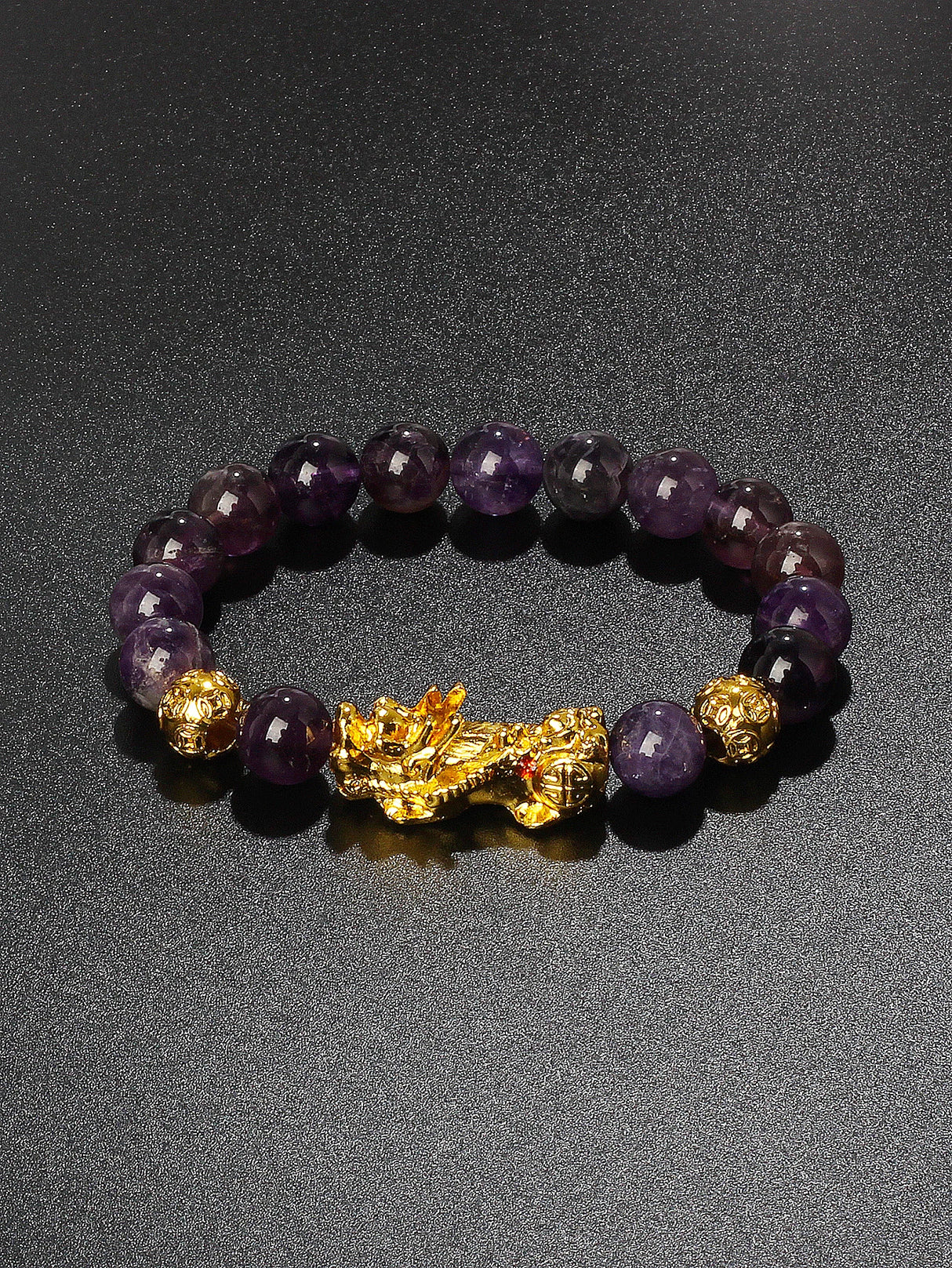 Pi Xiu charm Obsidian money bracelet for wealth attraction, protective energy, and feng shui styling.
