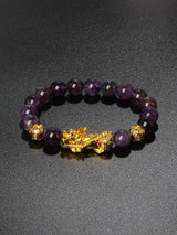 Pi Xiu charm Obsidian money bracelet for wealth attraction, protective energy, and feng shui styling.