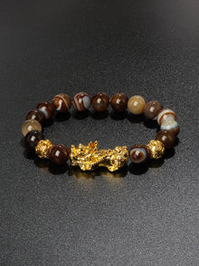 Pi Xiu wealth bracelet with Obsidian beads for prosperity intention, shielding, and routine use.