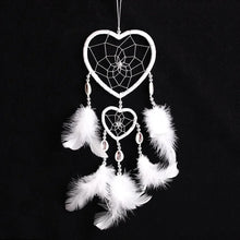 Pink and purple dreamcatcher hanging decor for bedroom styling, sleep space decoration, and boho wall arrangement.