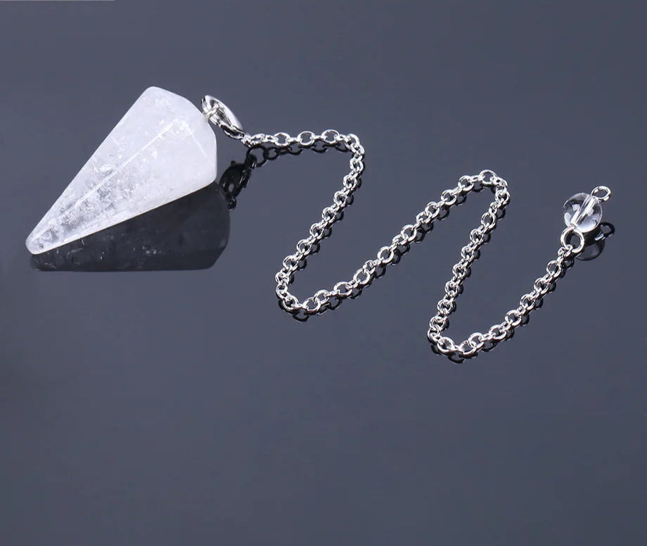 Pink Quartz Crystal Pendulum for dowsing, divination, and energy work.